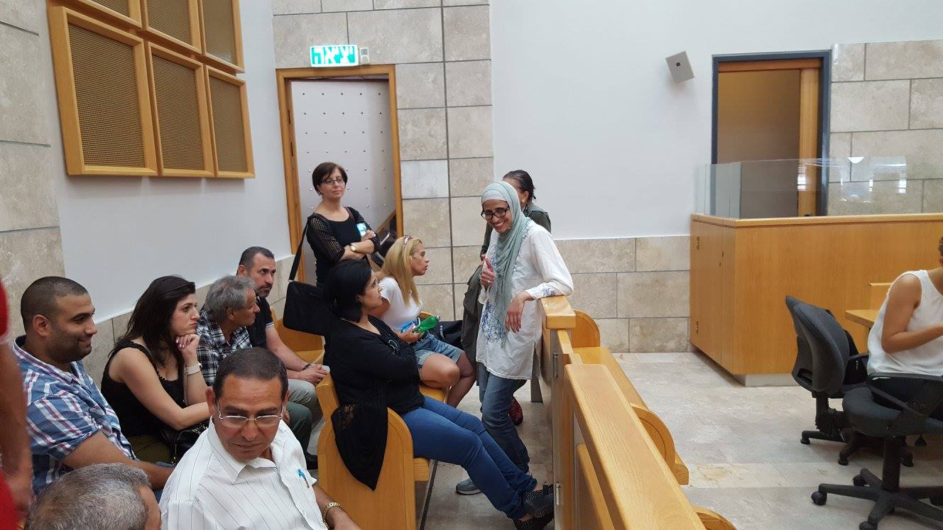 Dareen in court with friends